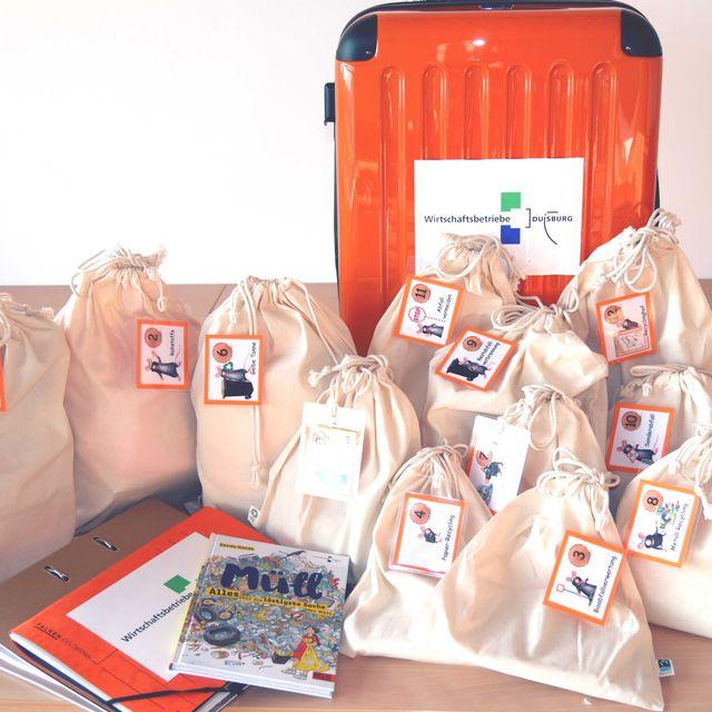 Oranger Themenkoffer Die Abfall-Werkstatt mit Jutebeuteln und Heften