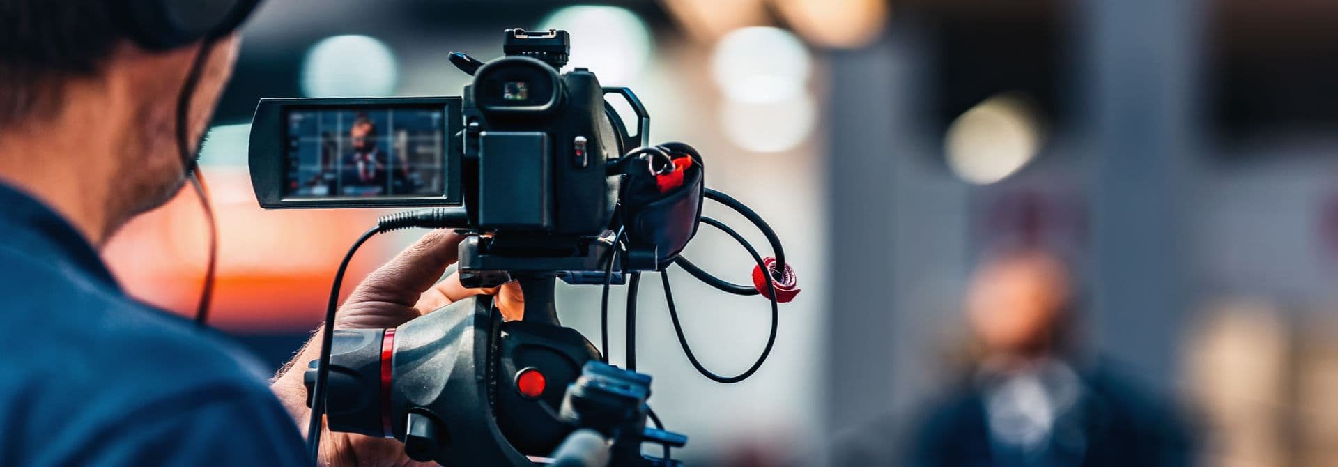 Presse-Kontakt Mann mit Kamera